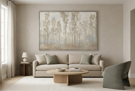 Misty woodland artwork in a softly styled living room