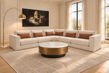 Warm ivory Yale sectional with muted rust pillows